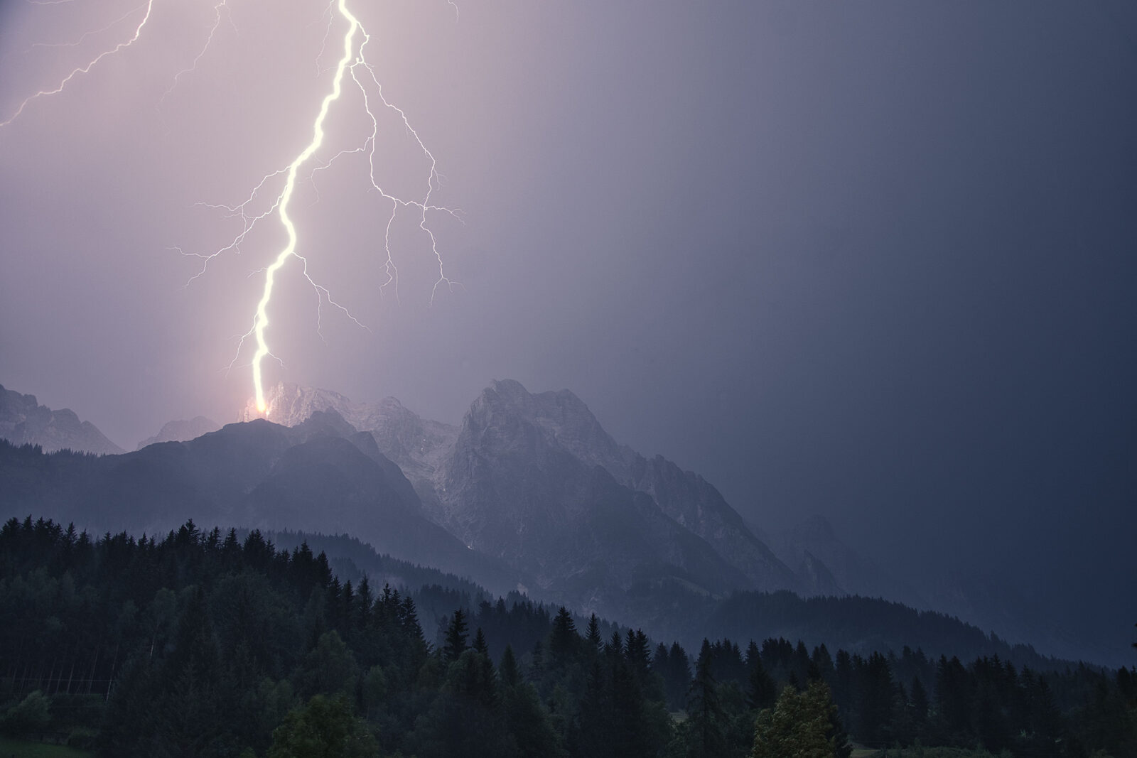 Lightning strike over a mountain
